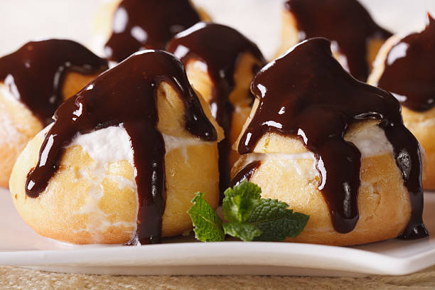 istock Fresh profiteroles withchocolate frosting macro. horizontal 484867312
