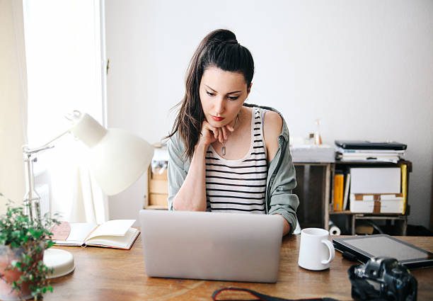 istock Female novelist writing on the laptop 484869334