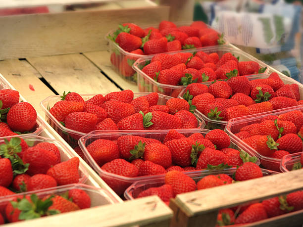 istock Fresh red strawberries in wooden box 484869674