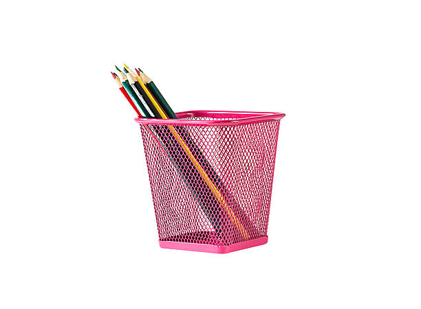 istock pencils in pink metal pot on a white background 484873088