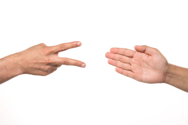 istock Isolated Male Hands Symbolizing Rock Paper Scissors on White 484875862