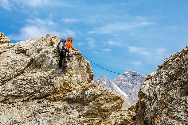 istock Male climber on rocky ridge 484878608