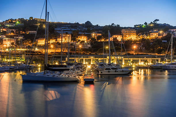 istock Sailing boats in the harbor at summer night 484879546