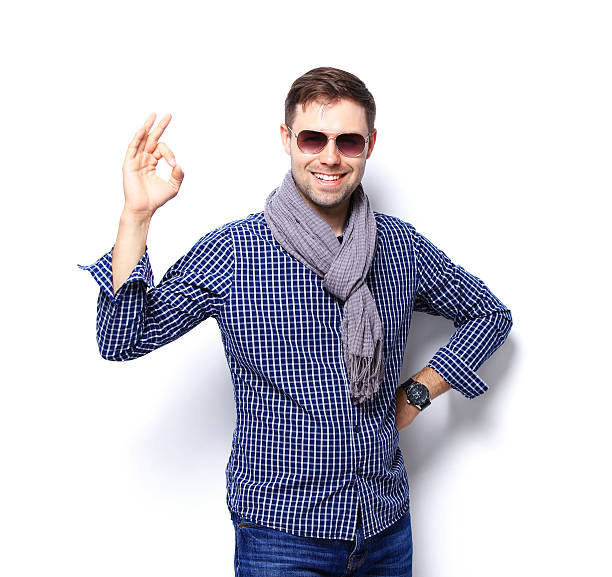 istock Happy man with thumbs up gesture, isolated on white 484887050