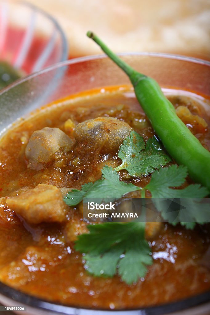 choley with green Chilli on it indian spicy chana masala with raw chickpeas and green chilli topping 2015 Stock Photo