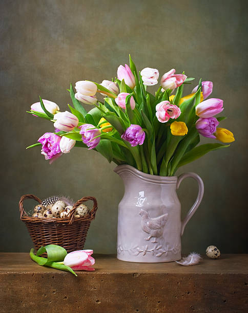 istock Still life with colorful tulips and quail tulips 484898469