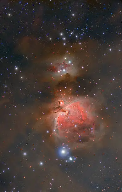 Famous Orion nebula in the constellation of Orion.  Mosaic taken by me with my high quality apochromatic telescope 75/500mm and modified astronomy camera - stacked many exposures in professional astronomy software to reduce noise and enhance details. Photographed through many nights in November of 2013. to collect more data for the best quality.  