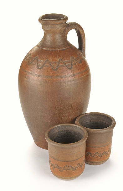 istock pitcher and two cups of clay 484900045