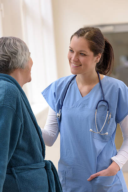 istock Doctor smiling at senior patient 484900848