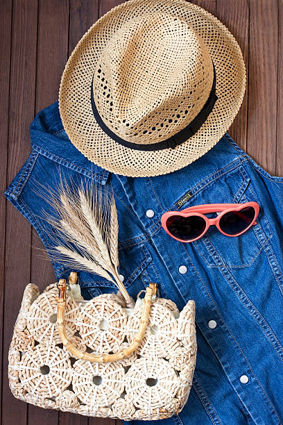 istock Hat, beach bag and sunglasses on the dress 484901954