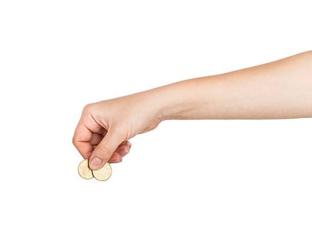 istock female(woman) hand hold a coin 484905170