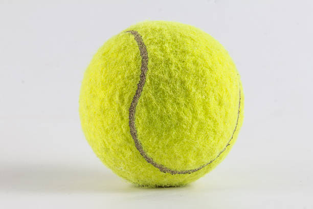 istock Single tennis ball isolated on white background 484906624