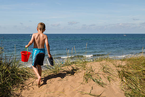 istock Boy with beach toys 484910234