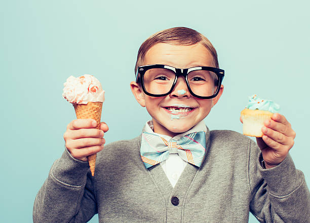 istock Young Nerd Boy Loves Dessert 484912778