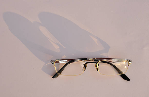 istock Shadow of old glasses 484915618