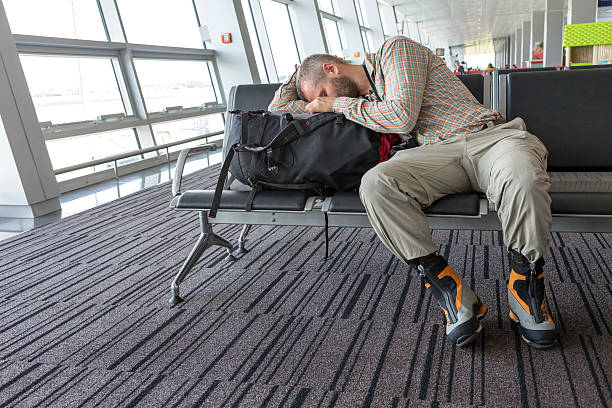 istock Man stuck at airport 484917786