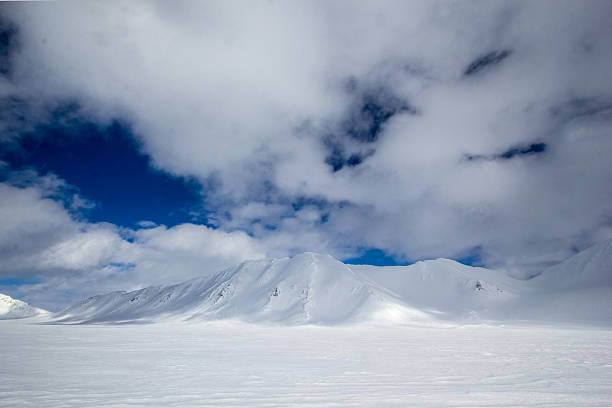 Arctic spring in south Spitsbergen Arctic spring in south Spitsbergen iceberg dramatic sky wintry landscape mountain stock pictures, royalty-free photos & images