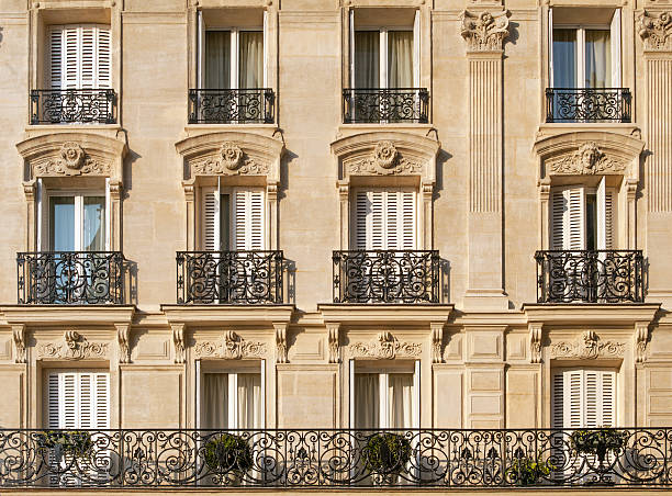 Paris apartments Typical facade of Parisian building near Notre-Dame hotel window view stock pictures, royalty-free photos & images