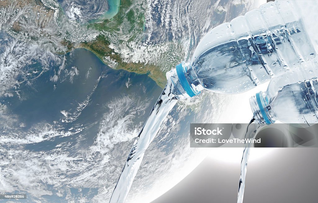 Water pouring  , Elements of image are furnished by NASA Water pouring on earth background , Elements of image are furnished by NASA 2015 Stock Photo