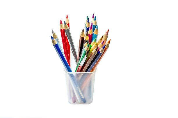 istock Close-Up color pencils in a plastic glass on white background 484928410