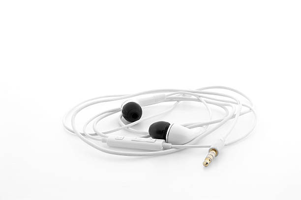istock white earphones on a white background 484930300