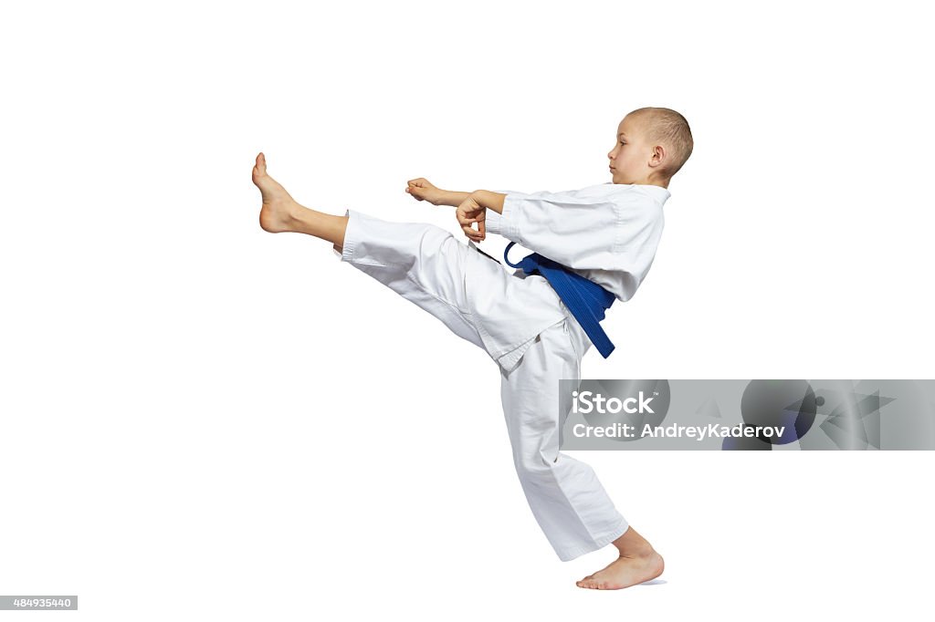 Mae-geri is beating the sportsman in karategi 2015 Stock Photo