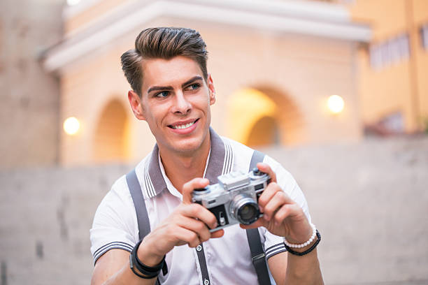 istock Young male taking pictures 484936678