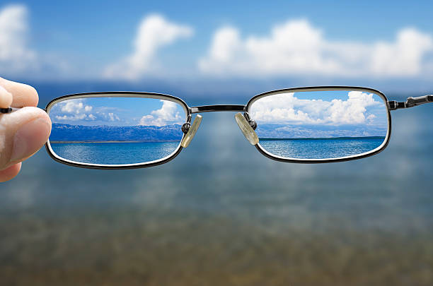 istock looking at the sea through the glasses 484938376