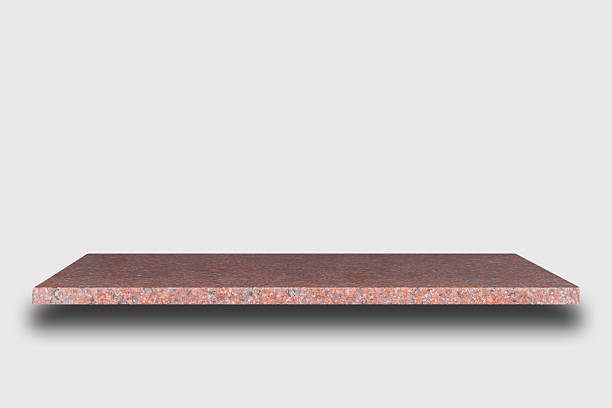 Empty top of natural stone shelves on wall