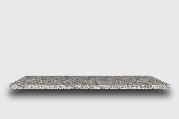 Empty top of natural stone shelves on wal