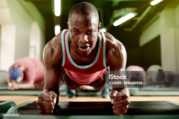 How Long Can You Hold A Plank Stock Photo - Download Image Now - Exercising, Men, Sweat