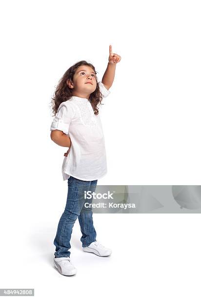 Full Length Portrait Of A Happy Little Girl On White Stock Photo - Download Image Now