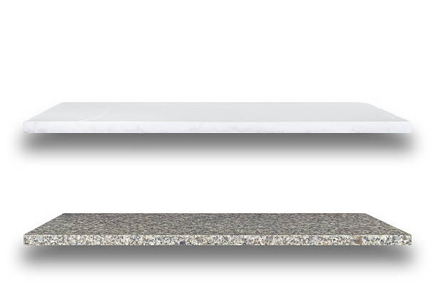 istock Empty top of natural stone shelves isolated on white background 484943152