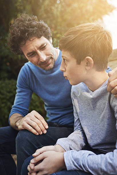 istock Giving his son some fatherly advice 484944470