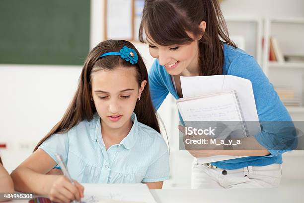 School Class Stock Photo - Download Image Now - 2015, Adult, Assistance