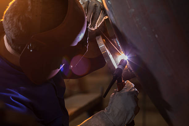 Welder in the factory Welding in the factory oxyacetylene stock pictures, royalty-free photos & images