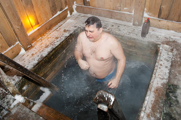 istock The man bathes in an ice-hole 484946517