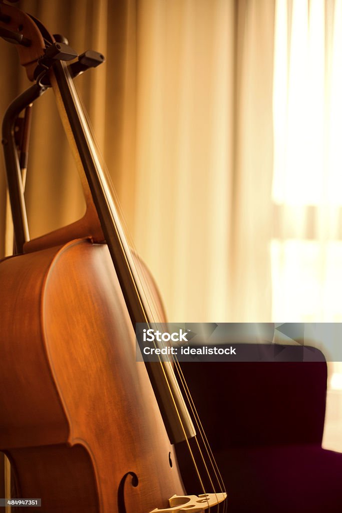 Portrait of a Cello Cello - musical instrument. Backdrop - Artificial Scene Stock Photo