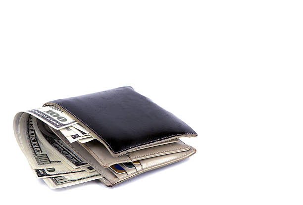 istock Old black wallet with dollar  isolated on white background 484949143