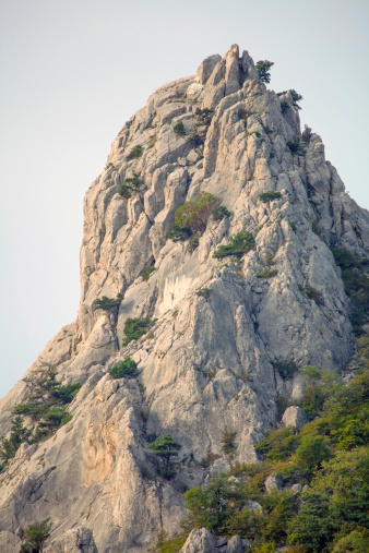 Rock mountain peak with plants in Crimea.