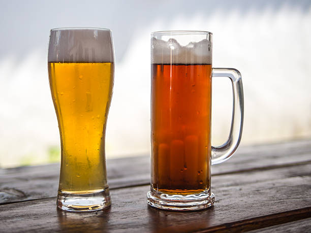 istock Beer mug and glass with light or dark drinks 484950278