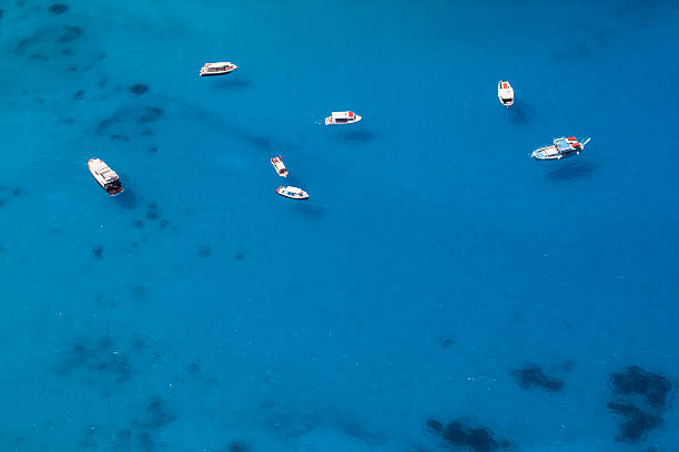 istock Boats Anchored in a Sea Bay 484950444