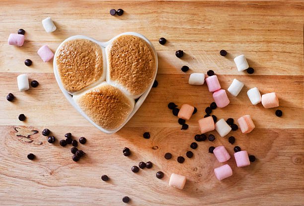 istock Marshmallow with chocolate on the wood plate 484950534