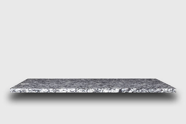 istock Empty top of natural stone shelves on wal 484950746