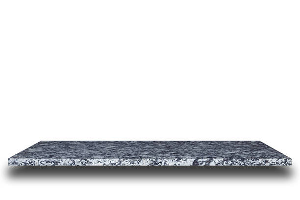 istock Empty top of natural stone shelves isolated on white background 484950776