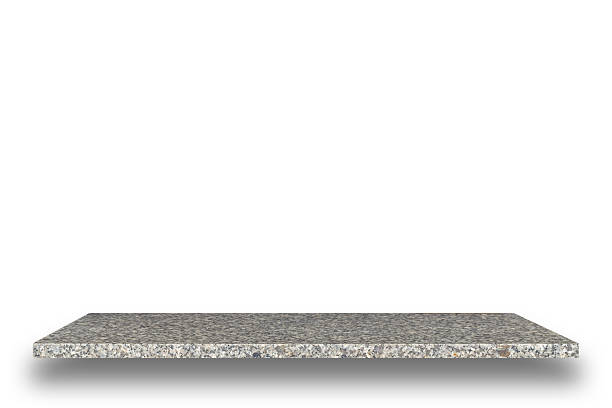 istock Empty top of natural stone shelves isolated on white background 484950860