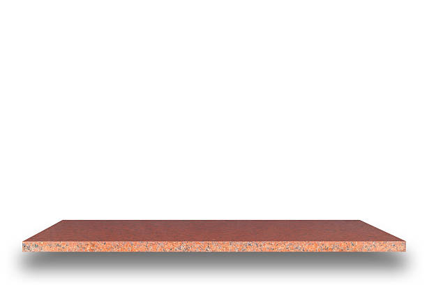 istock Empty top of natural stone shelves isolated on white background 484951056