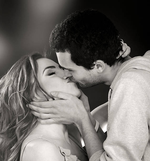 istock young couple kissing 484951303