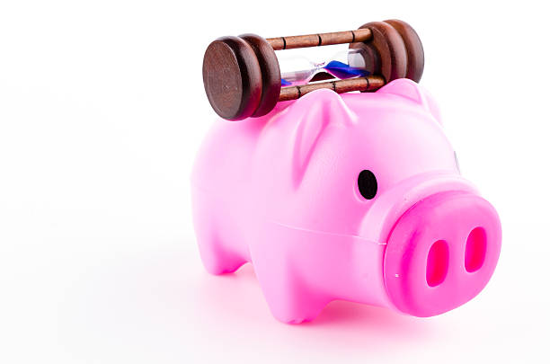 istock piggy bank sand clock isolated white background 484951487