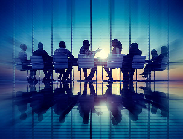 istock Group of Business People Meeting Back Lit Concept 484951548